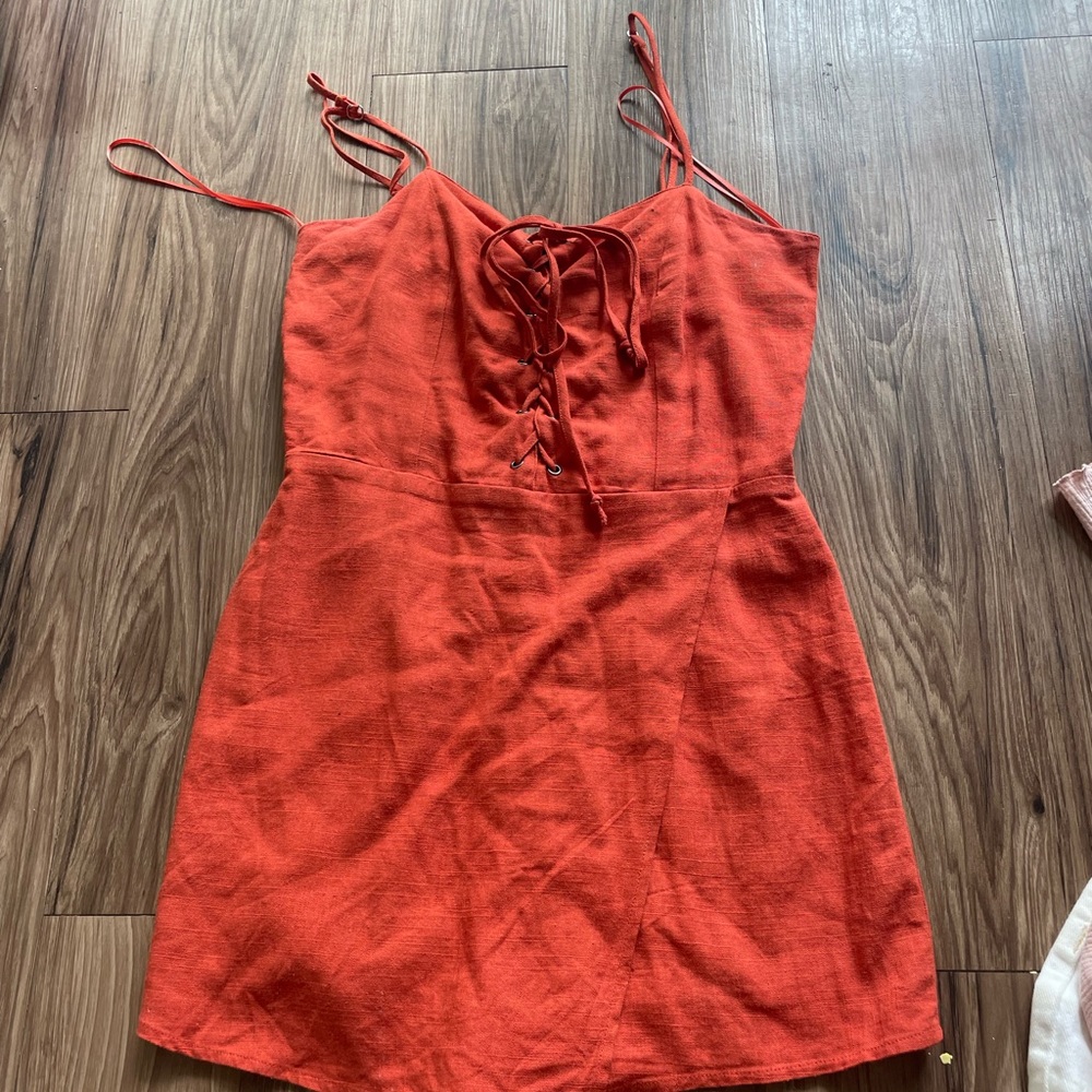 Size S orange romper